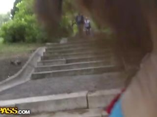Young femme fatale films her tits in a public streets clip